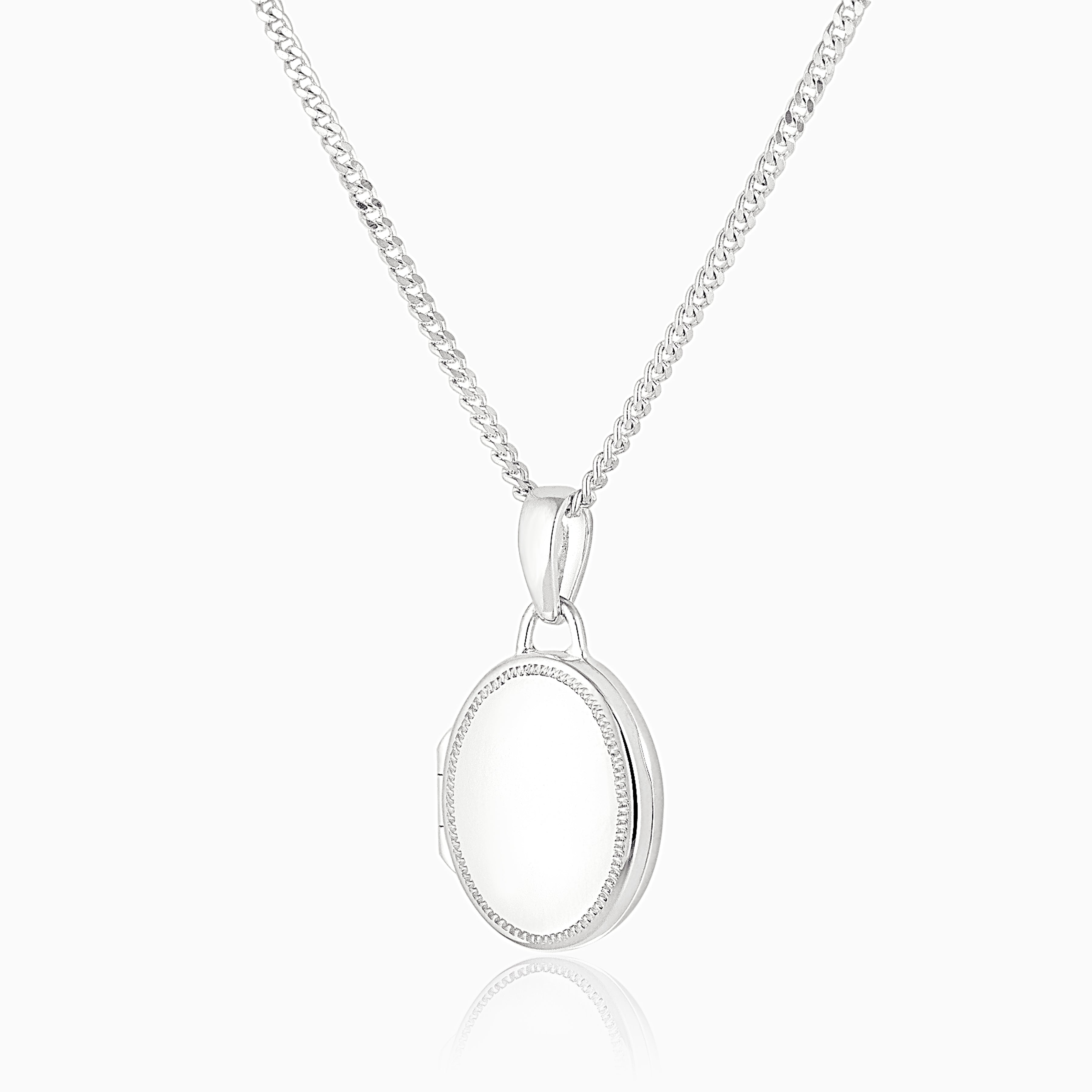 sterling silver oval locket with a riddle-edged engraved border, on sterling silver rope chain