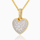 Petite reversible 18 ct gold heart locket set with aquamarine one one side and diamonds on the other side, on an 18 ct gold chain