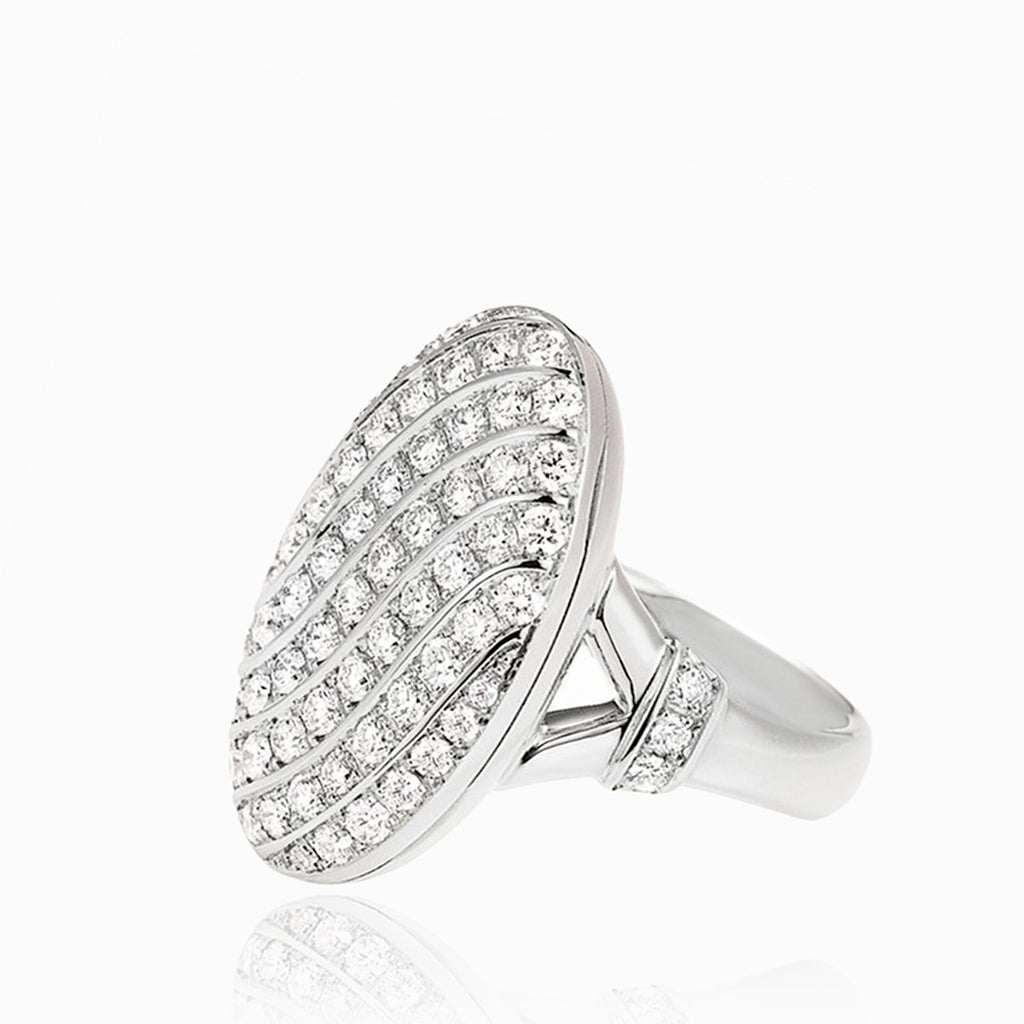 18 ct white gold oval locket ring pave set with diamonds. There are also diamonds set across the shank.