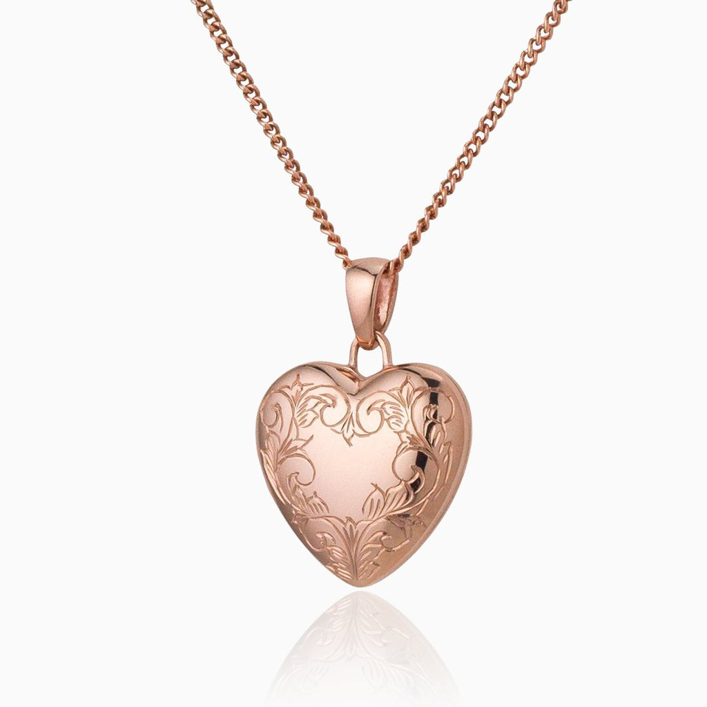 9 ct rose gold heart locket with engraved border on a 9 ct rose gold curb chain