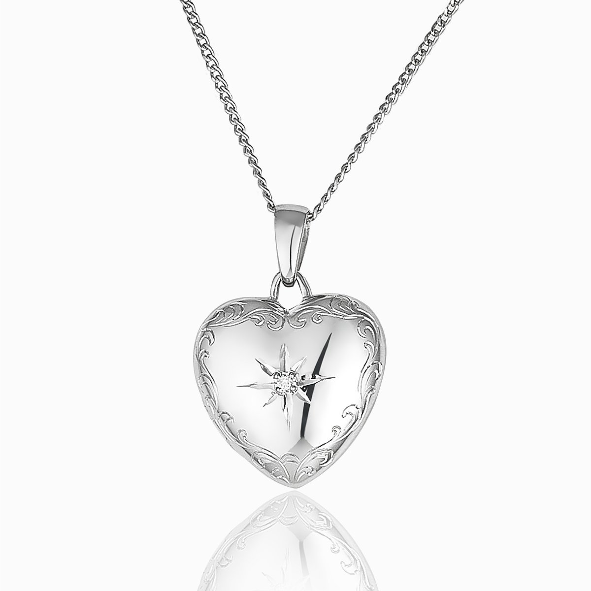 9 ct white gold heart locket set with a diamond on a 9 ct white gold curb chain.
