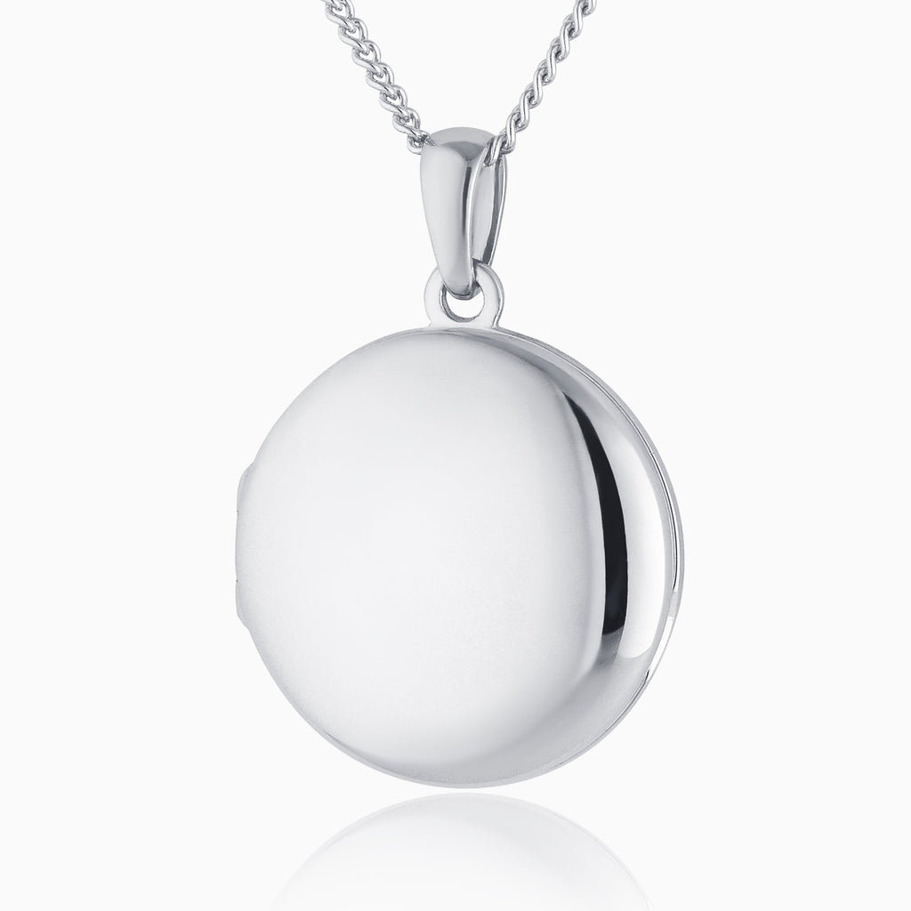 Front shot of a premium white gold white locket with 9 ct white gold curb chain. 