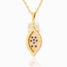 Glass backed view of an elongated 9 ct gold locket set with sapphires on a 9 ct gold rope chain