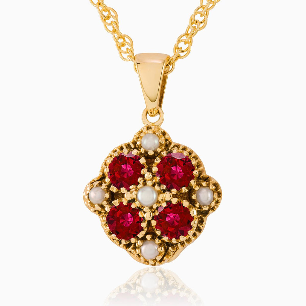 9 ct gold tipped square locket set with garnets and seed pearls, on a 9 ct rope chain