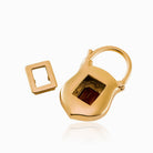 Back view of a 9 ct gold padlock locket showing the glass back door 