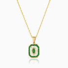 Tabular shaped 9 ct gold locket set with emeralds and diamonds , on a 9 ct gold rope chain