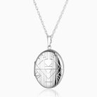 sterling silver oval locket with a chevron pattern engraving design on the front, on a sterling silver rope chain