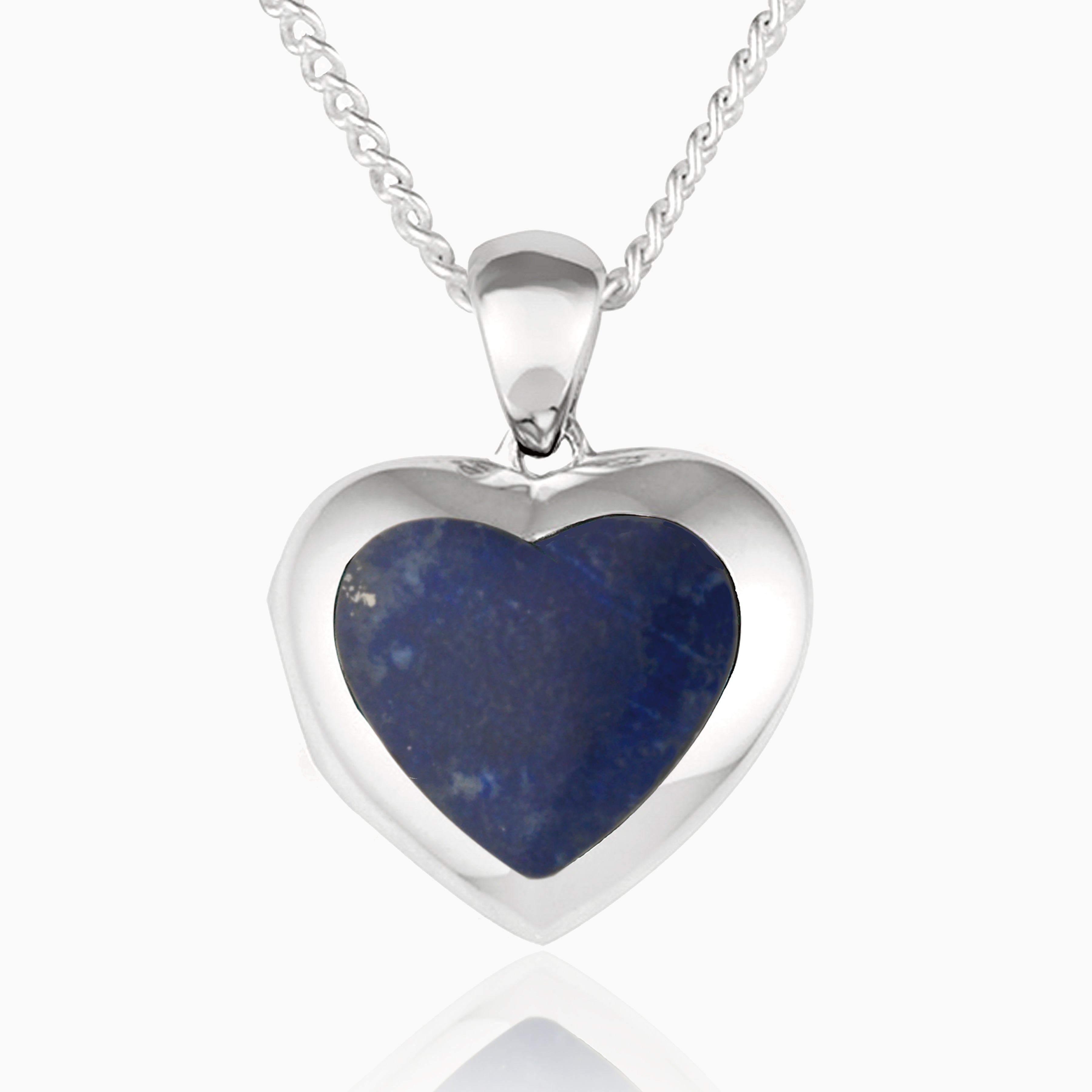 Front shot of a petite heart-shaped sterling silver locket set with lapis lazuli on a sterling silver curb chain.