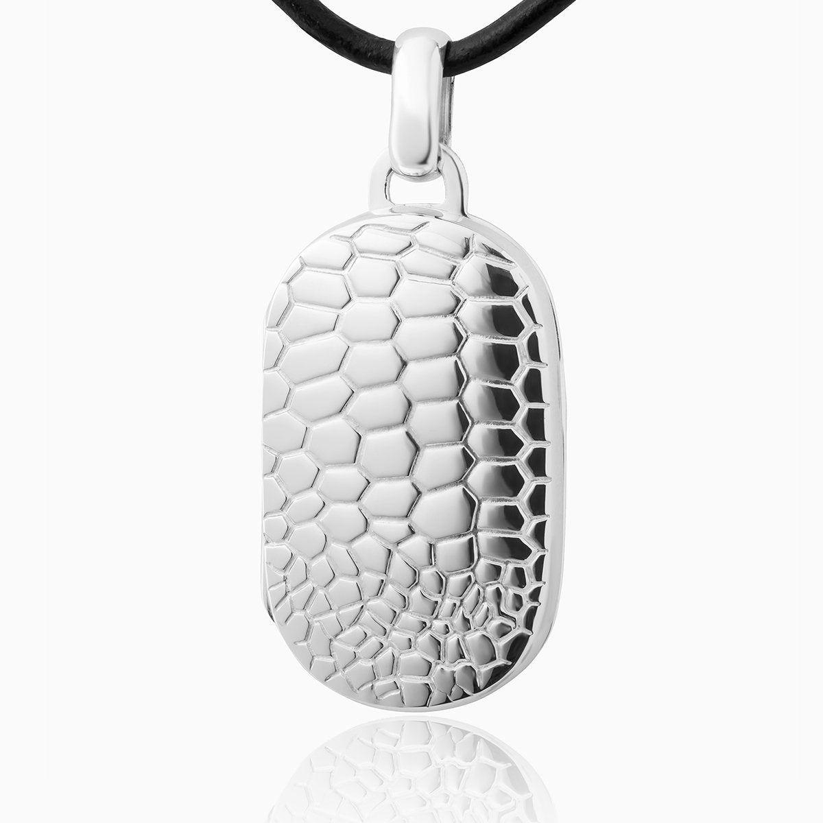 Sterling silver dog tag shaped locket embossed with a crocodile design on a black leather neck cord