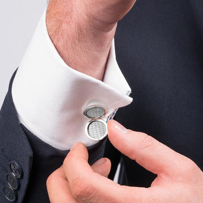 Model showing open view of a sterling silver round cufflink locket
