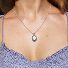 Product title: Dainty Silver and Topaz 4-Photo Locket, product type: Locket