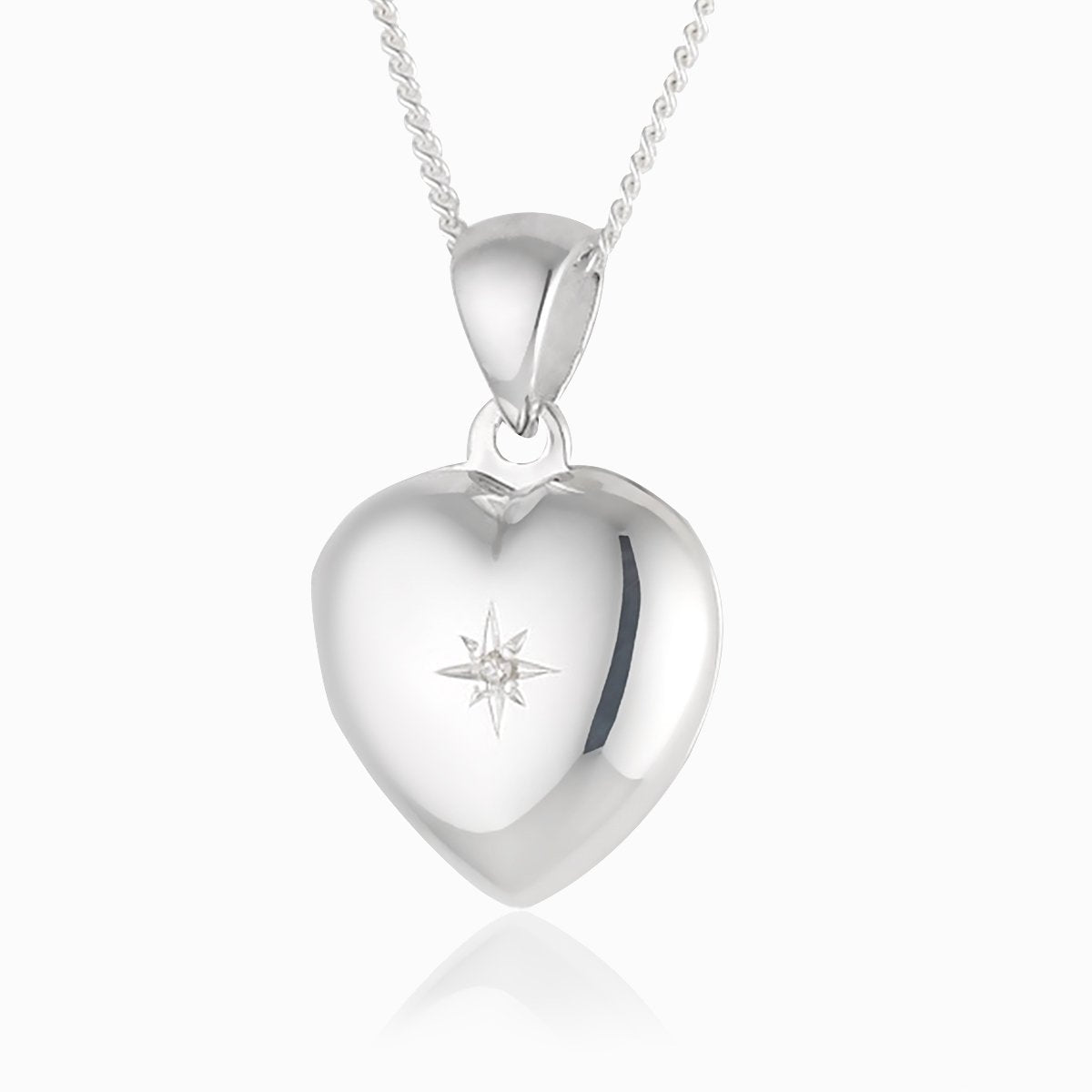 This is a front shot of a tiny 925 sterling silver heart locket with a diamond in the middle. 