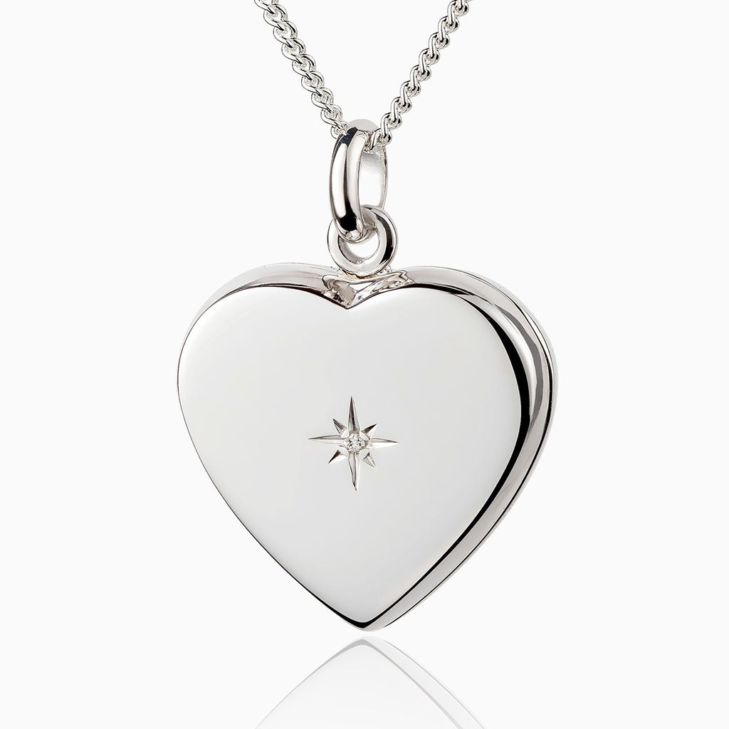 Sterling silver 925 heart locket set with a diamond, on a sterling silver curb chain.