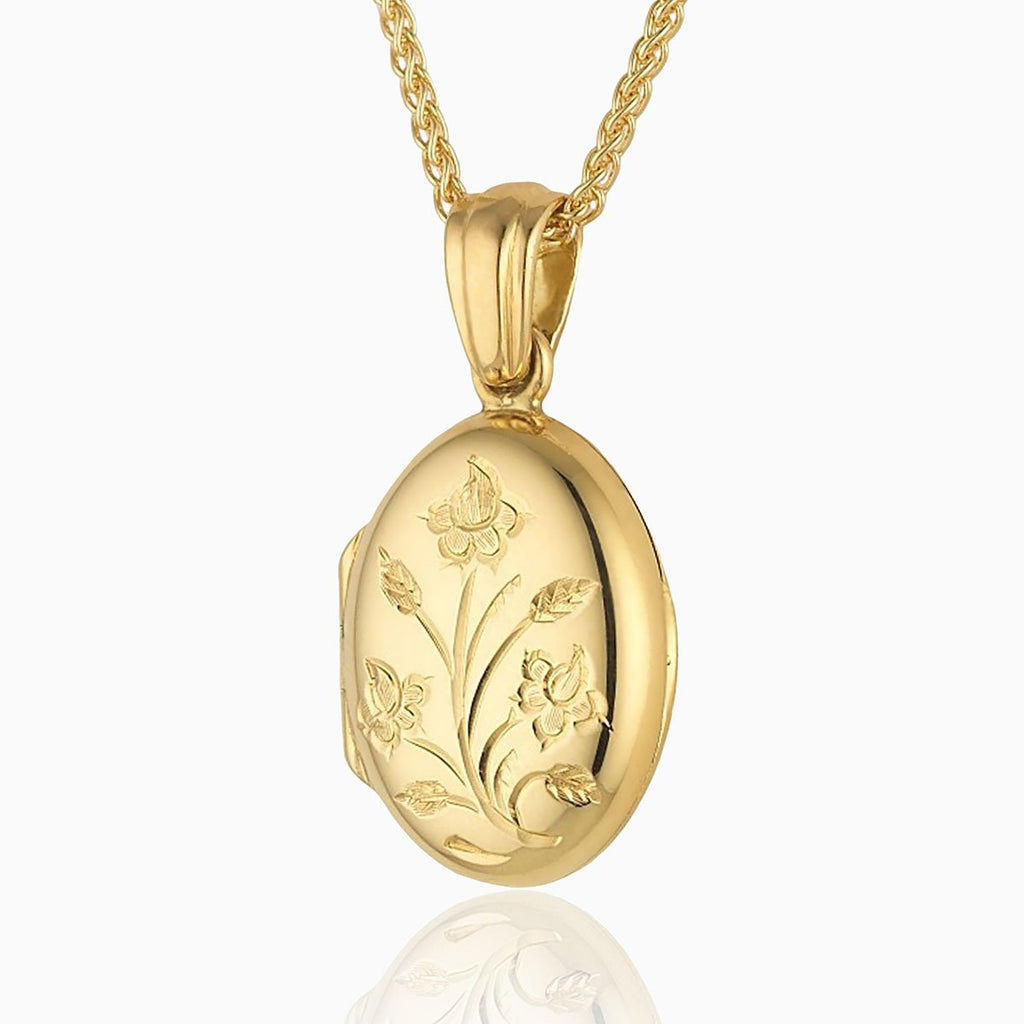 18 ct gold oval locket engraved with a floral design on an 18 ct gold spiga chain