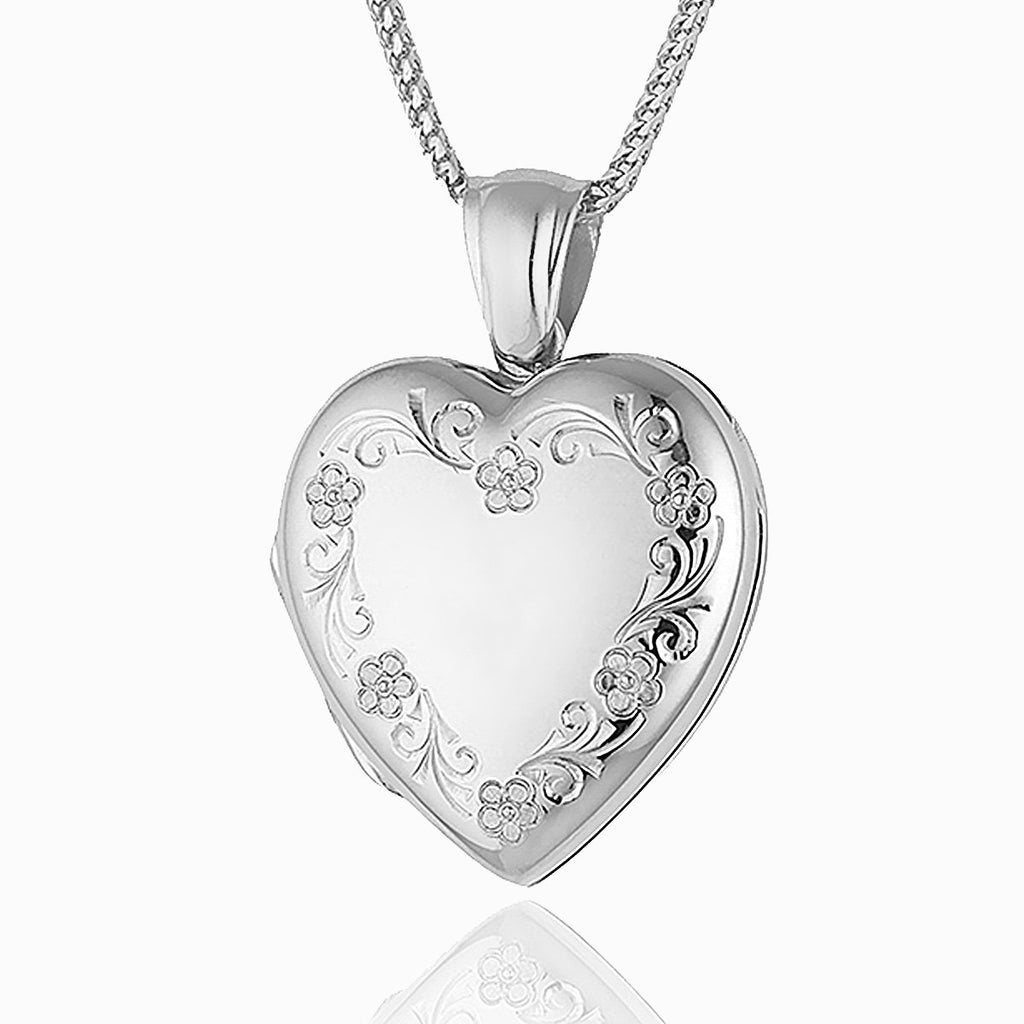 18 ct white gold heart locket engraved with a floral border on an 18 ct white gold chain
