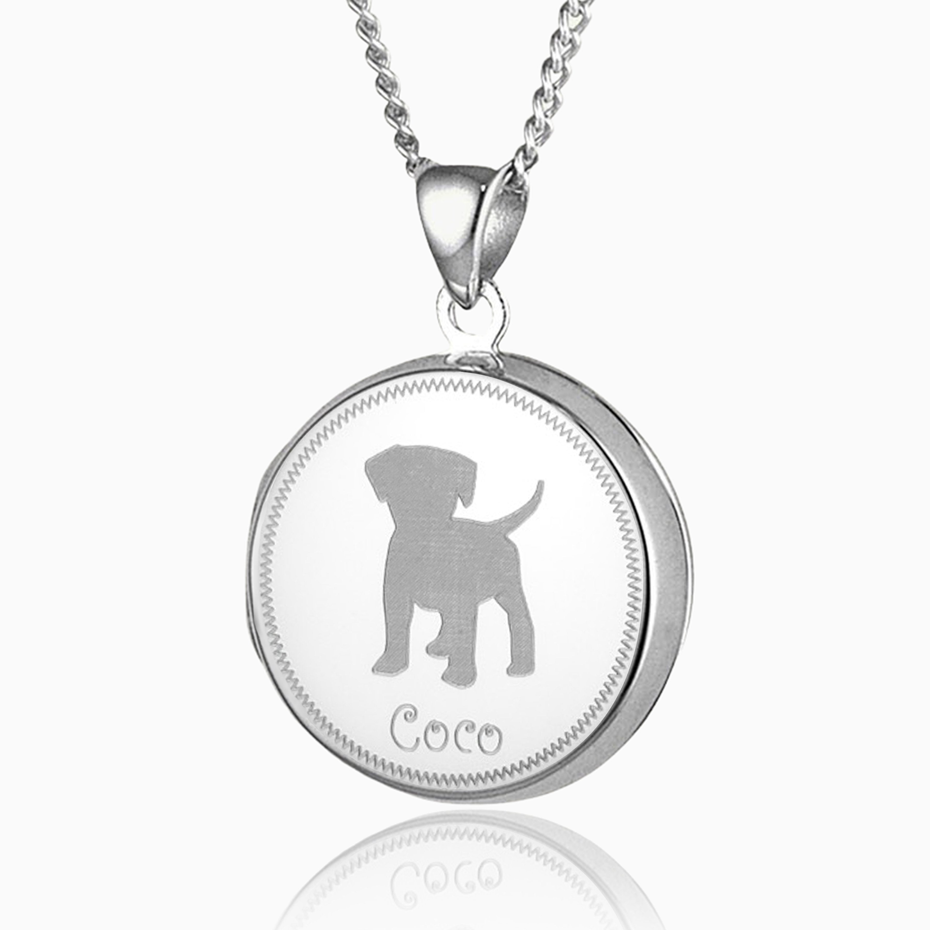 sterling silver round locket with a puppy engraved on the front and the name Coco underneath,  on a sterling silver curb chain
