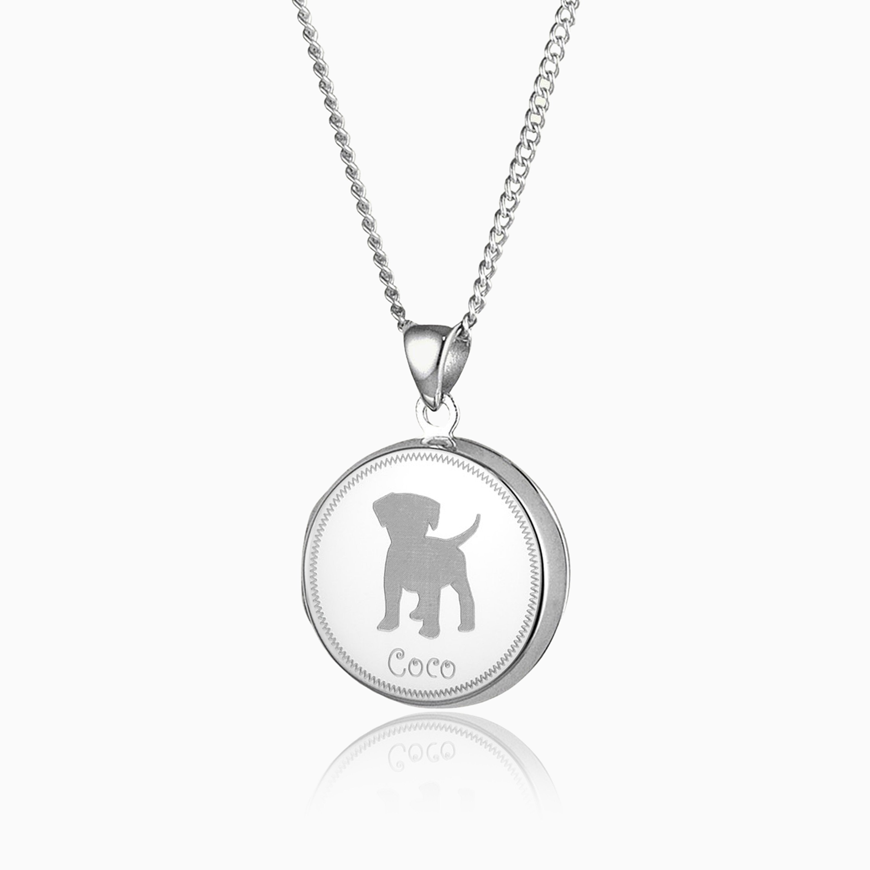 sterling silver round locket with a puppy engraved on the front and the name Coco underneath, on a sterling silver curb chain