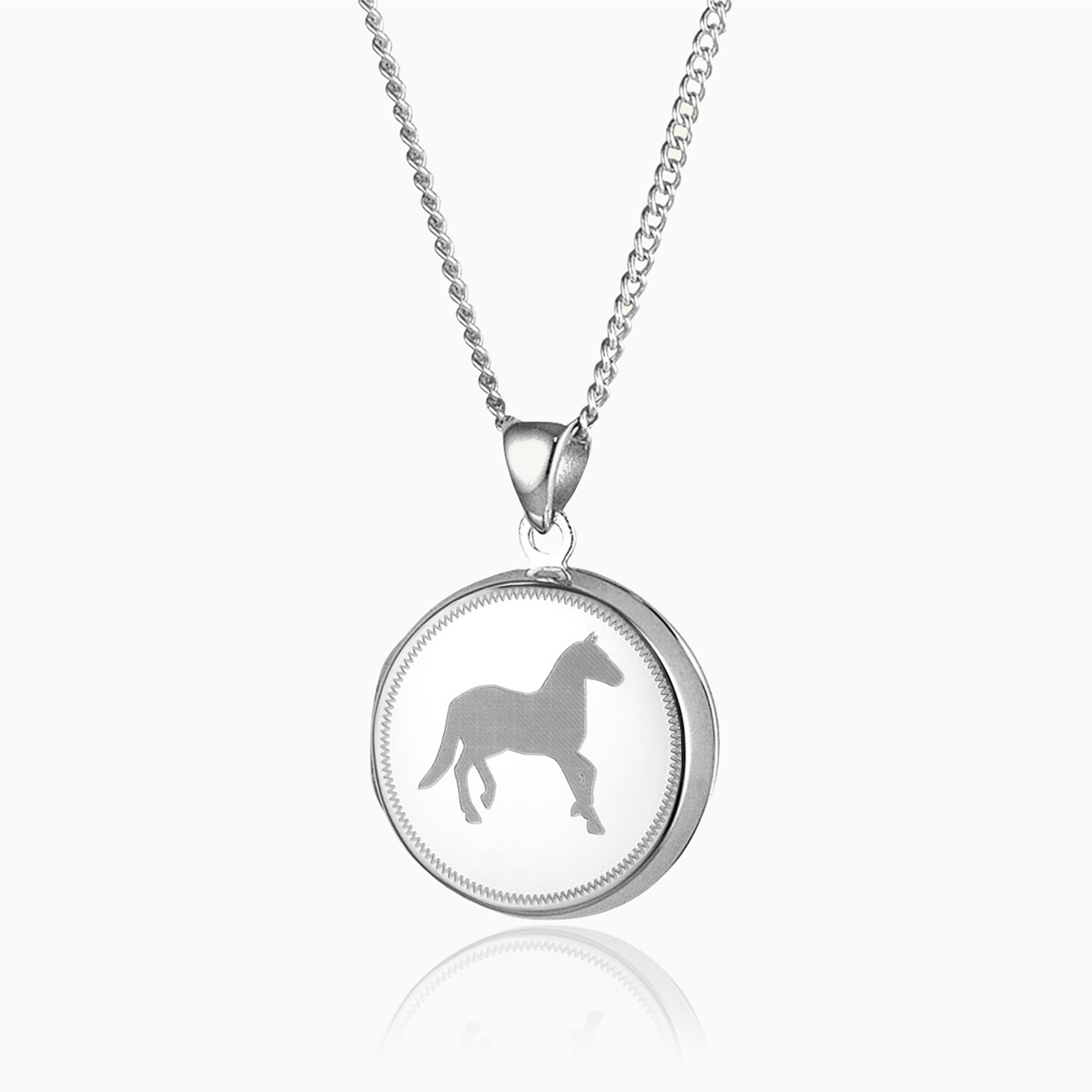 sterling silver round locket with an engraved horse on the front