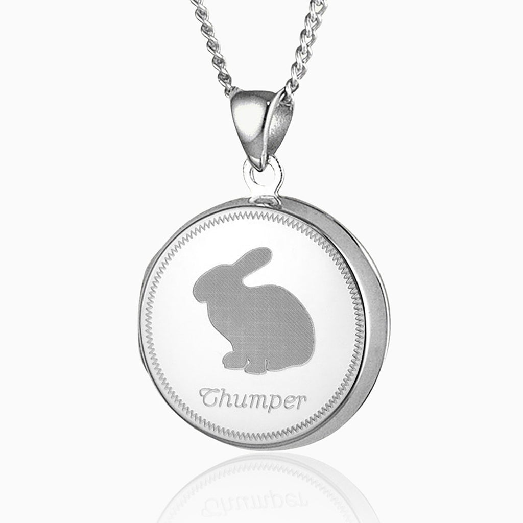 sterling silver round locket with a bunny silhouette engraved on the front and the name Thumper underneath, on a sterling silver curb chain
