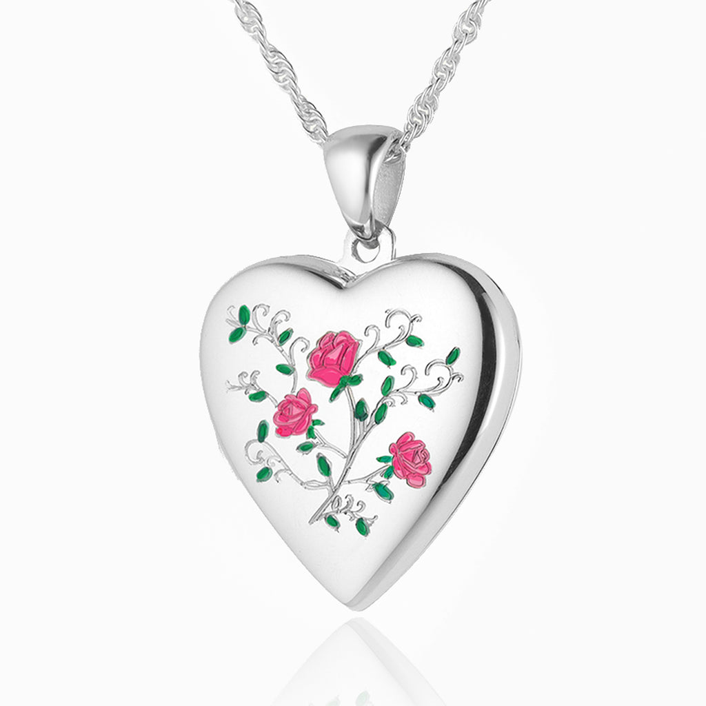 Front shot of a heart-shaped contemporary sterling silver heart locket with a vintage rose and leaves design, set on a sterling silver curb chain.