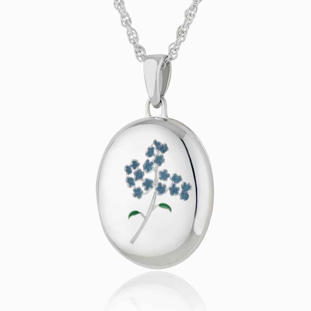 sterling silver oval locket painted with a forget-me-not flower on the front, on a sterling silver rope chain