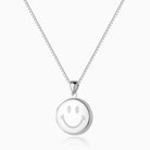 sterling silver round locket with a smiley emoji engraved on the front on a sterling silver box chain