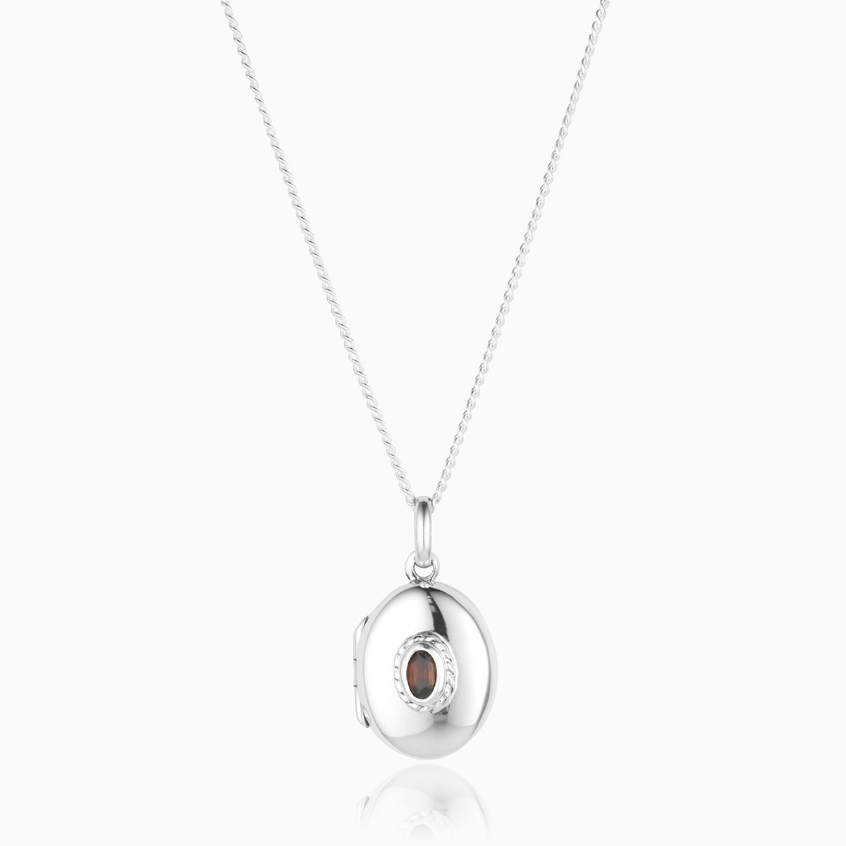 Product title: Silver and Garnet Locket, product type: Locket