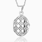 925 sterling silver oval locket with cubic zirconia stones and harlequin design