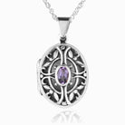 sterling silver oval locket with filigree front and a central purple amethyst, on a sterling silver chain