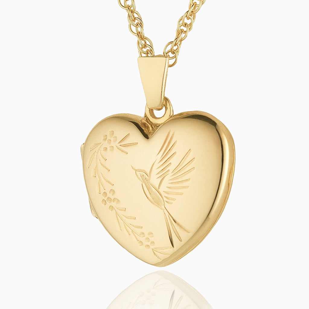 Front shot of a 9 ct gold heart locket with an engraved bird design on a 9 ct gold rope chain.