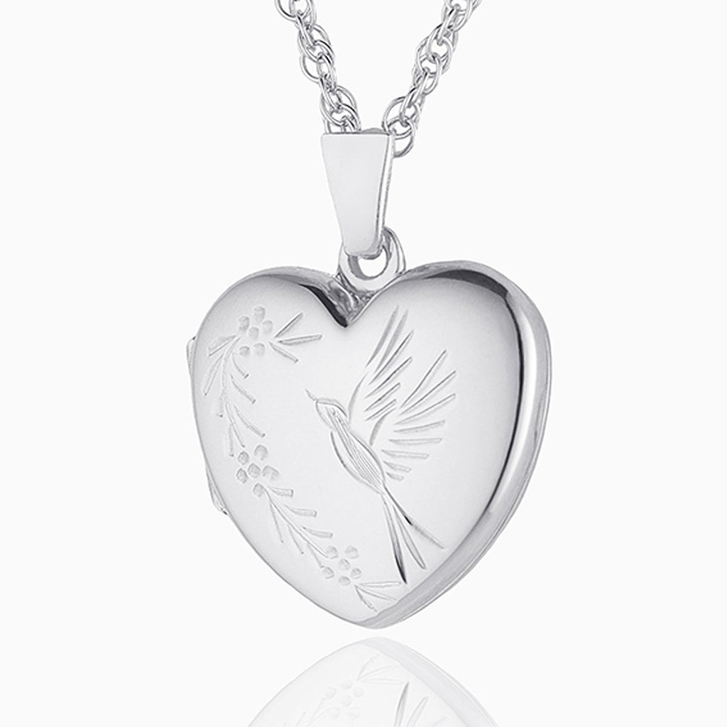 9 ct white gold heart locket engraved with a bird design on a 9 ct white gold chain