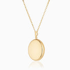Large 9 ct gold oval 4-photo polished locket on a 9 ct gold chain