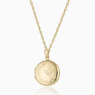 9 ct gold roun locket with an engraved bird design on a 9 ct gold rope chain