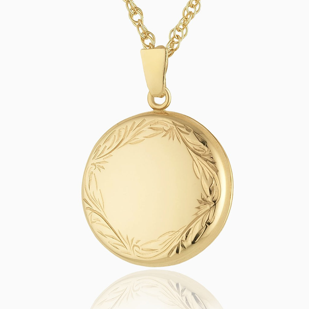 9 ct gold round locket with an engraved border on a 9 ct gold rope chain