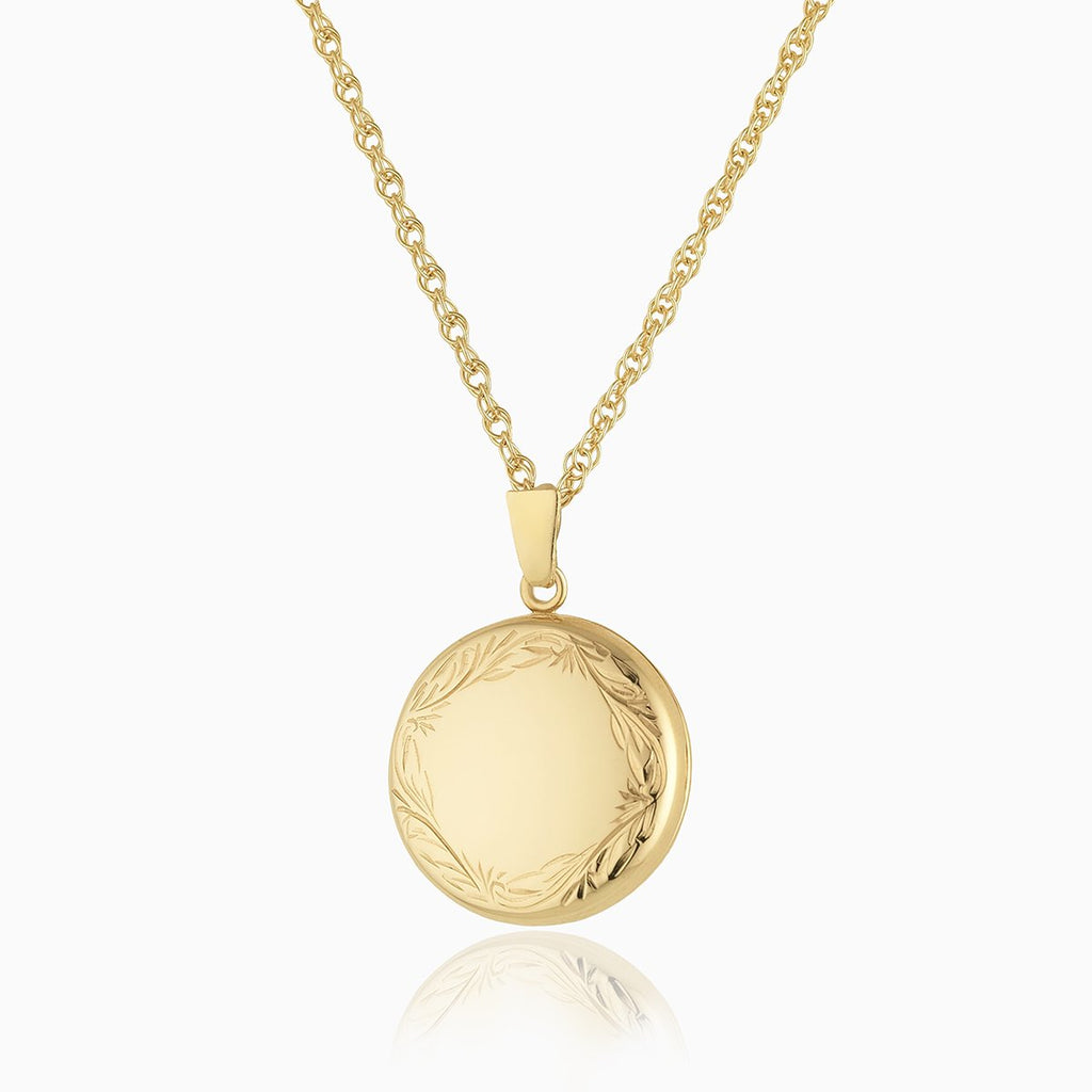 9 ct gold round locket with an engraved border on a 9 ct gold rope chain
