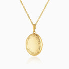 9 ct gold polished oval locket on a 9 ct gold curb chain