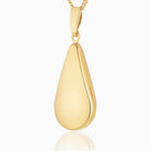 9 ct gold polished teardrop-shaped locket on a 9 ct gold curb chain