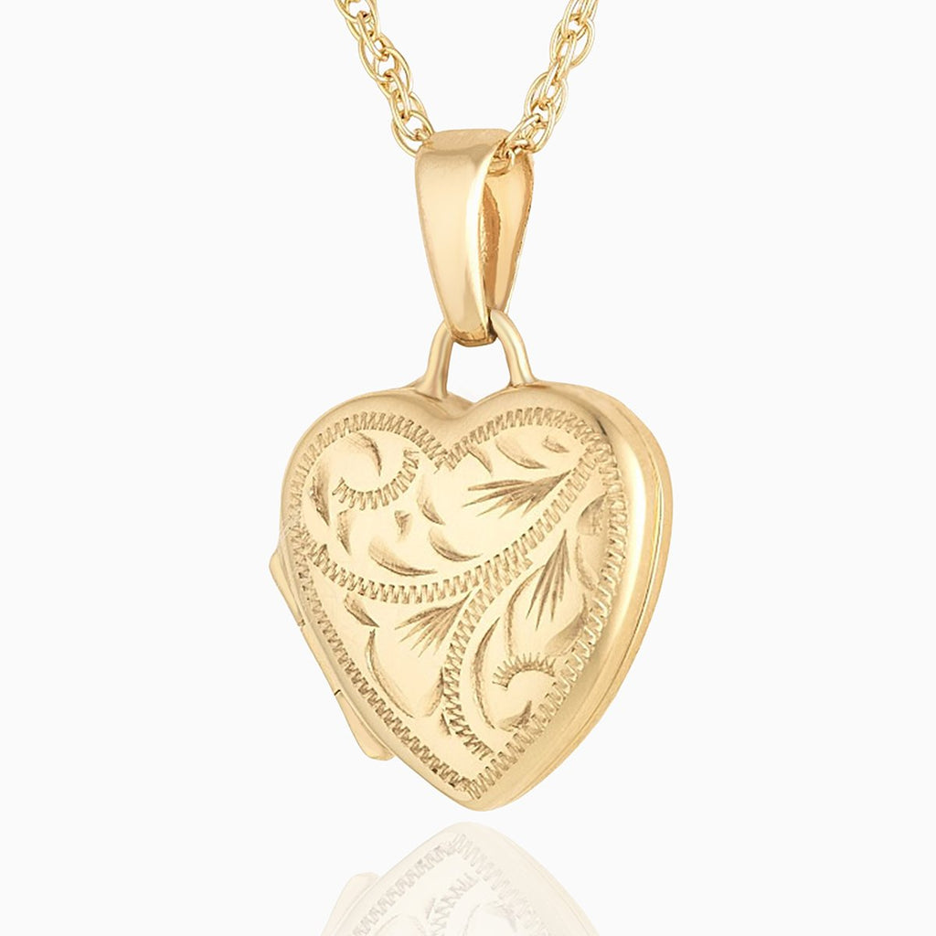9 ct gold heart shaped locket with all over engraving on a 9 ct gold rope chain