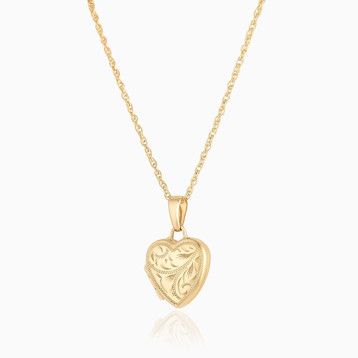 9 ct gold heart shaped locket with all over engraving on a 9 ct gold rope chain