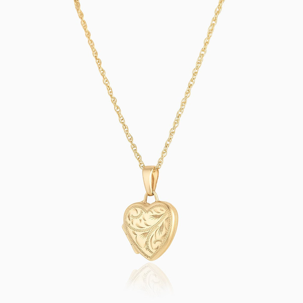 9 ct gold heart shaped locket with all over engraving on a 9 ct gold rope chain