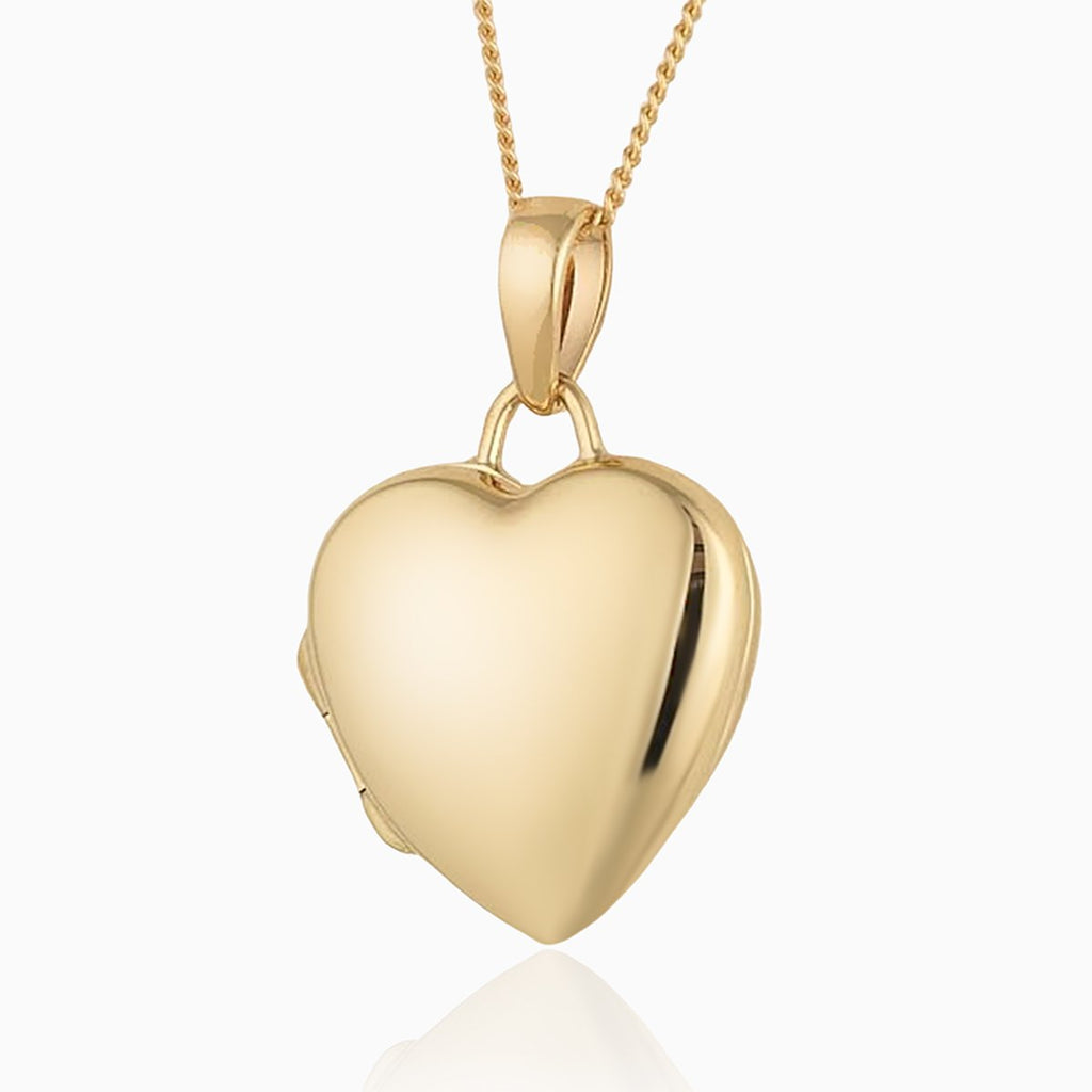 9 ct gold polished heart locket on a 9 ct gold curb chain