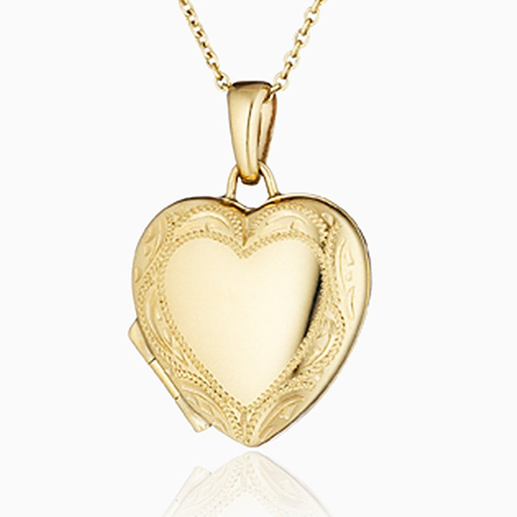 9 ct gold heart locket with engraved border on a 9 ct gold chain