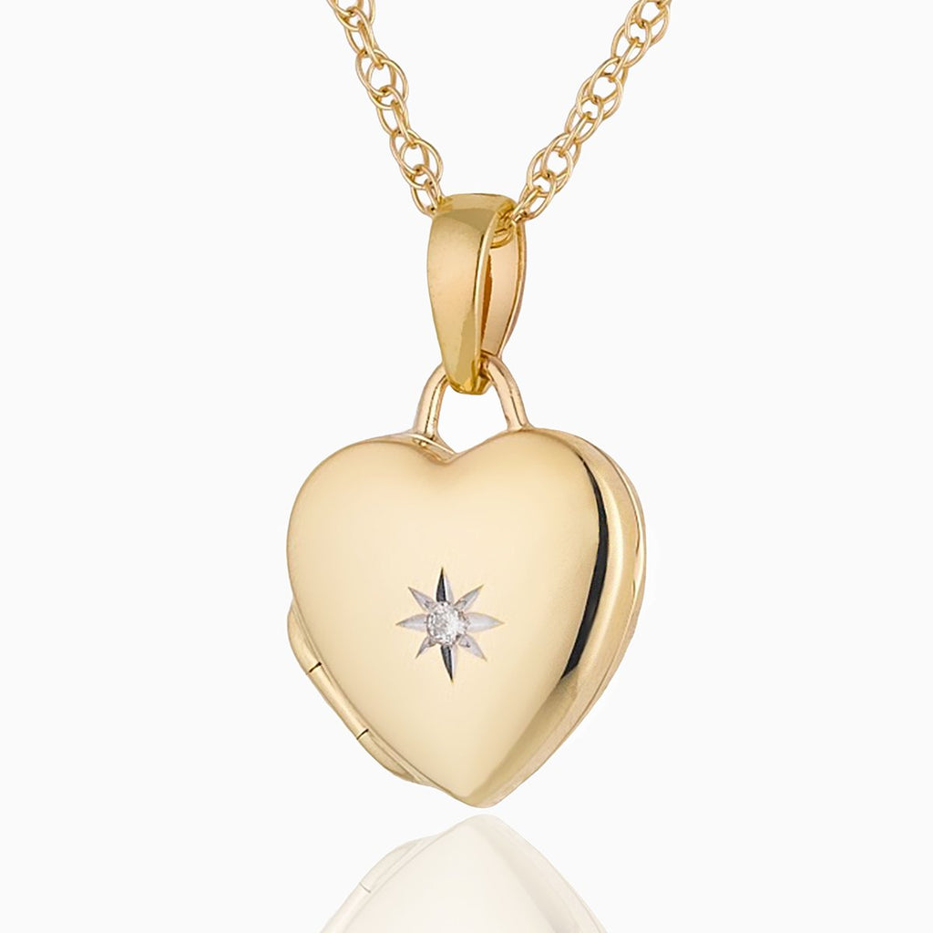 Front shot of a petite 9 ct gold heart locket set with a diamond on a 9 ct gold rope chain.