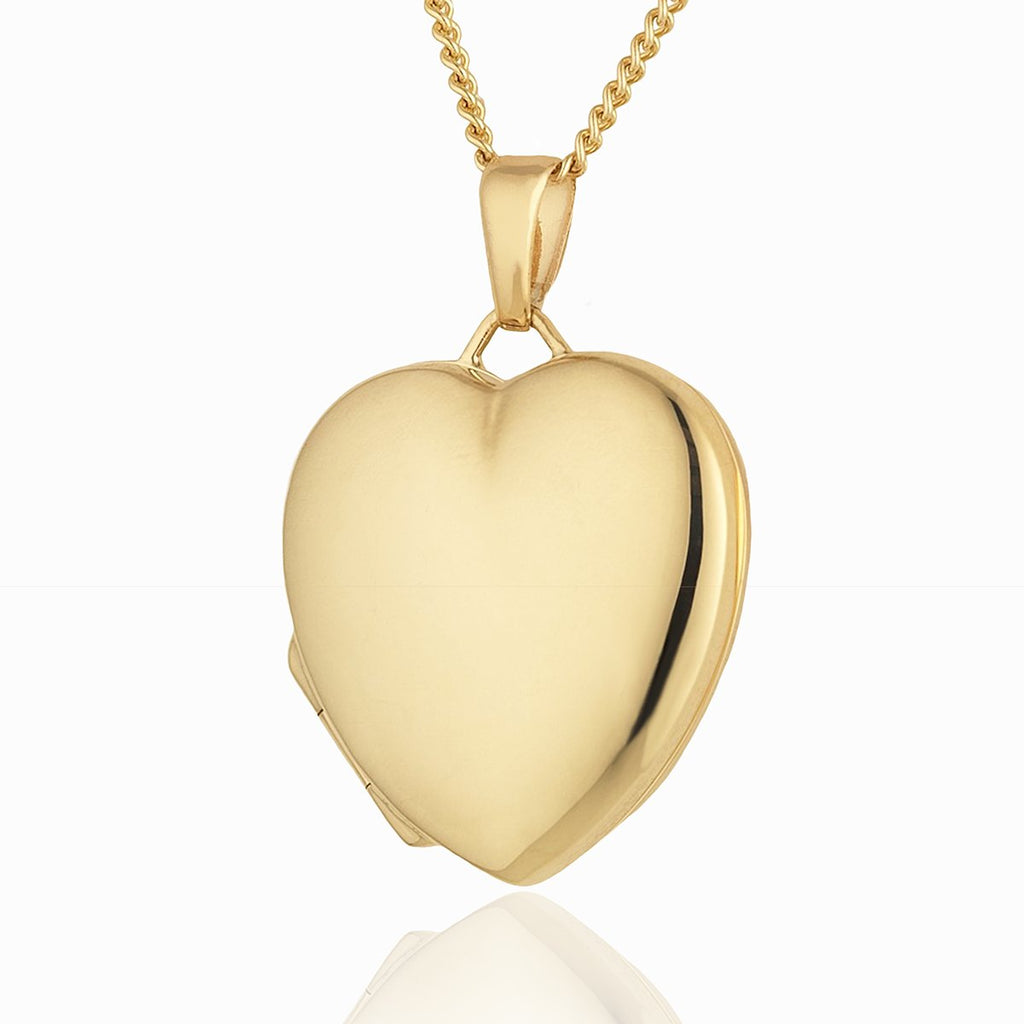 9 ct gold heart locket on a 9 ct gold curb chain