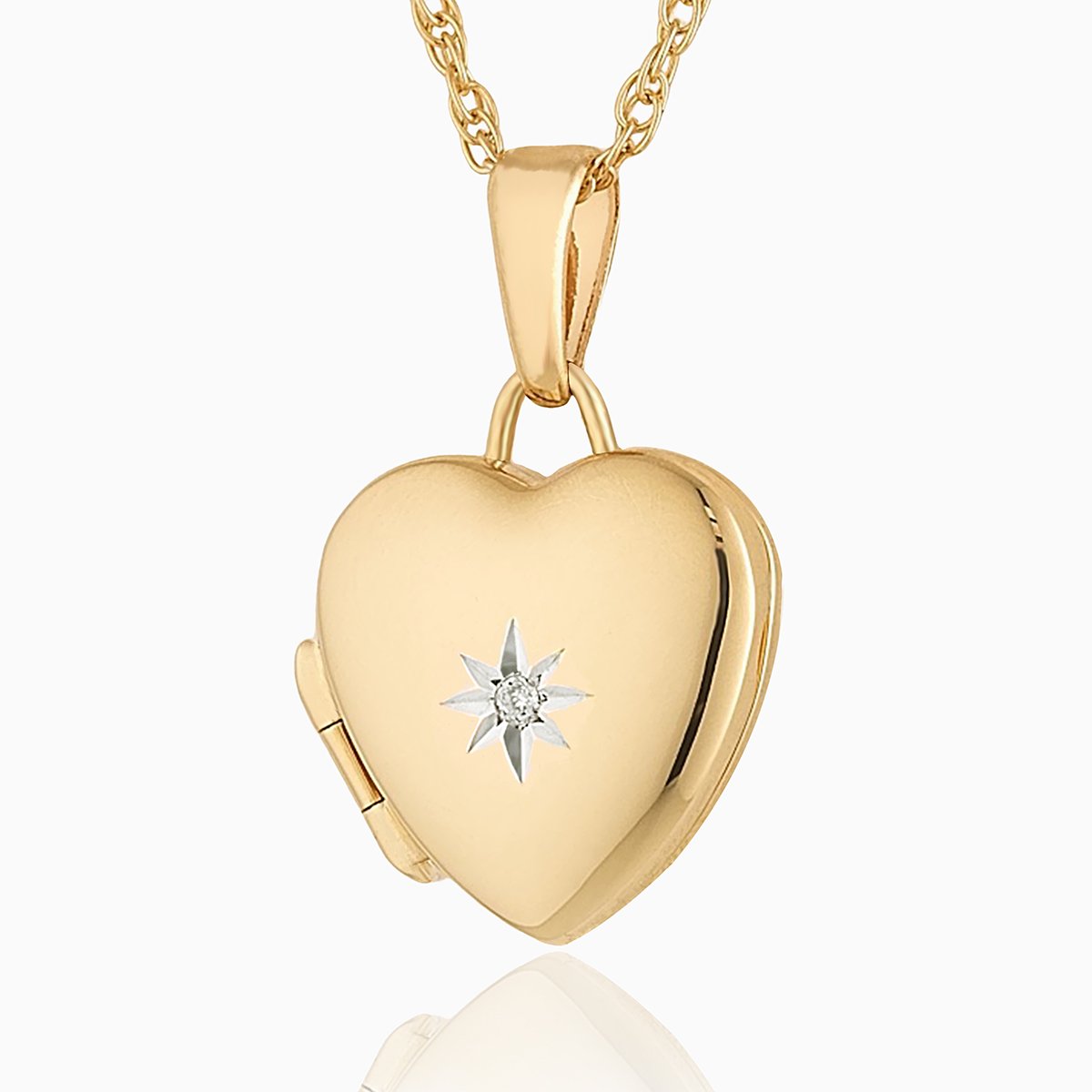 Petite 9 ct gold heart locket set with a diamond on a 9 ct gold rope chain.