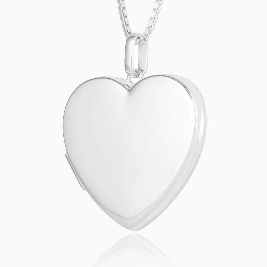 Front shot of a large polished sterling silver heart locket, set on a sterling silver box chain. 