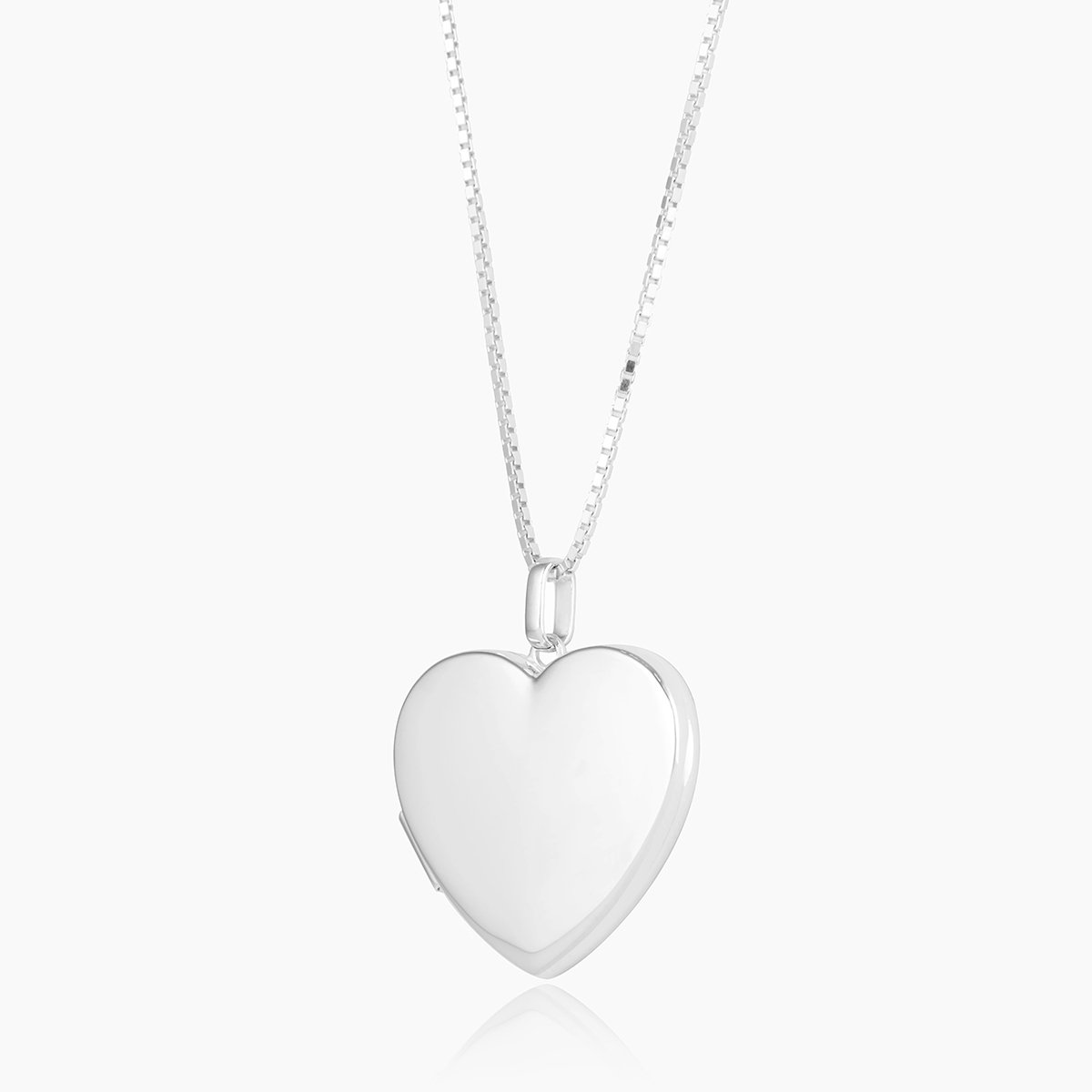 Front shot of a large polished sterling silver heart locket, set on a sterling silver box chain.