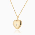 9 ct gold heart locket set with a diamond on a 9 ct gold rope chain.