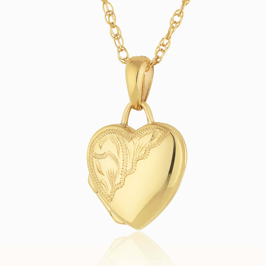 Front shot of a 9 ct petite scalloped gold locket set with a 9 ct gold rope chain. 