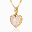 18 ct gold petite geart locket, reversibe with pink rose quartz on one side and diamonds on the other side. The bail also set with diamonds front and back. On a n 18 ct gold rope chain